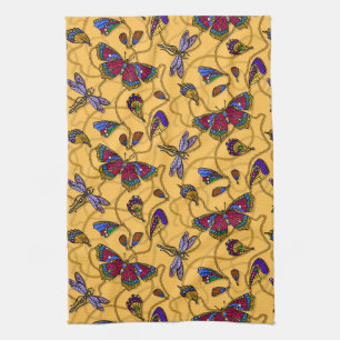 Jewellery butterflies and dragonflies on yellow kitchen towel