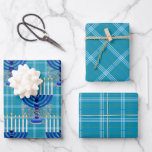 Jewish-Menorah-Plaid-Cyan Wrapping Paper Sheet<br><div class="desc">From my new Jewish Collection coming into stores now... MENORAH PLAID CYAN. A large silver and blue detailed 9 branch menorah design on an all-over background plaid pattern. All of the candles appear lit. The plaid pattern is gold, white and cyan. You get 3 sheets of gift wrapping sheets. One...</div>