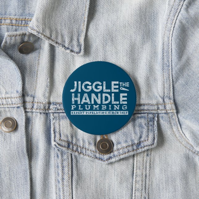 Jiggle the Handle Plumbing White Gfx Teal BG 3 Inch Round Button (In Situ)