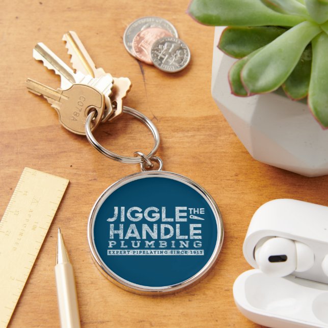 Jiggle the Handle Plumbing White Gfx Teal BG Keychain (Desk)