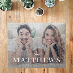 Jigsaw Puzzle | Modern Family Name and Photo<br><div class="desc">A stylish modern photo holiday jigsaw puzzle featuring your surname in elegant classic typography paired with a handwritten script font in white over your full-size photograph. Simple yet striking, this minimal design transforms your photo into a fun and meaningful festive keepsake. Perfect for Christmas gifts, family entertainment, or holiday decor,...</div>