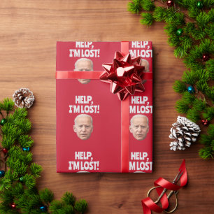 JOE BIDEN CONFUSES CHRISTMAS WRAPPING PAPER