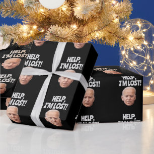 JOE BIDEN CONFUSES CHRISTMAS WRAPPING PAPER