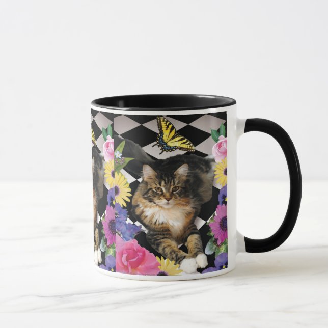 Joli chat de minou dans la tasse de jardin (Droite)