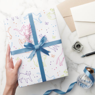 Joli papier cadeau avec des chats dessinés à la ma
