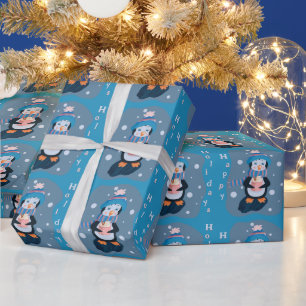 Joli papier cadeau pingouin dessin animé bleu pour