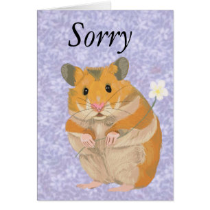 Joli petit Hamster tenant une fleur