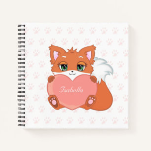 Joli petit renard tenant un cahier en forme de cœu
