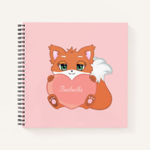 Joli petit renard tenant un cahier en forme de cœu