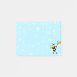 Jolie abeille bourdon sur des notes Post-it bleu c