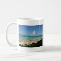 Jour rêvant la tasse de café de banc de sable des