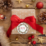 Joy Family Name Christmas Wreath Classic Round Sticker<br><div class="desc">Elegant Christmas greenery wreath personalized name stickers. Design features beautiful wreath of greenery,  pine cone and red holly berries. Perfect addition to your gift wrapping accessories this holiday season. Easy to personalize all text. Happy Holidays!</div>