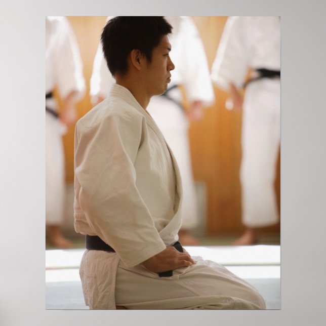 Judo Master Kneeling On a Mat Poster (Front)