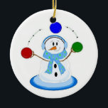 Juggling Snowman Ceramic Ornament<br><div class="desc">A cool snowman juggling coloured balls of red, blue and green. All wrapped up in his earmuffs and scarf.</div>