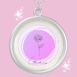 June Rose Birth Flower Necklace - Personalized<br><div class="desc">Embrace the timeless beauty of June with our "June Rose Birth Flower Necklace." This elegant piece features a beautifully crafted rose, the symbol of love and honour, set within a lavender-hued circle. Add a personal touch with the name of your choice, elegantly inscribed below the rose, making this necklace a...</div>