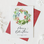 Juniper and Holly Wreath Merry Christmas Holiday Card<br><div class="desc">Merry Christmas! This customizable Christmas card sends holiday greetings and messages to family and friends. It features a watercolor wreath of winter berries and greenery. Personalize by adding names,  years,  and messages. This watercolor Christmas card is also available in other cardstock. Matching items are also available.</div>