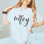 Just Married Wifey Modern Elegant simple Script T-Shirt<br><div class="desc">Cherish the beauty of love with this 'Wifey' Valentine's Day t-shirt. The simple and elegant caligraphic design, embellished with a delightful red heart, makes this tee an ideal choice for anyone celebrating marriage, honeymooners, or those in the newlywed phase. Elevate your expression of love with this stylish and refined t-shirt....</div>