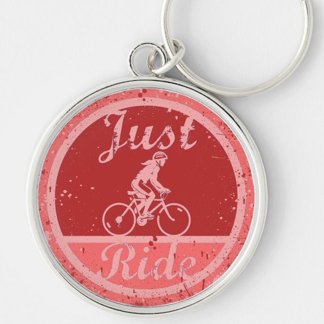 Just Ride Pink Paint Splashes Female Cyclist Keychain (Front)