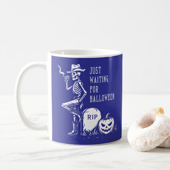 Just Waiting for Halloween Cowboy Skeleton Coffee Mug (With Donut)