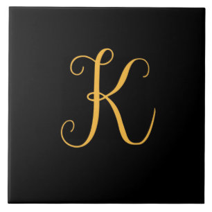K gold on black monogram tile
