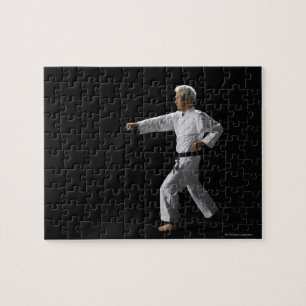 Karate master demonstrating, studio shot jigsaw puzzle