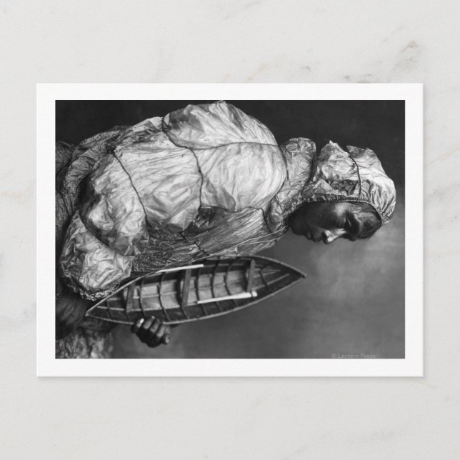 Kayaker wearing water-proof jacket with toy boat postcard (Front)