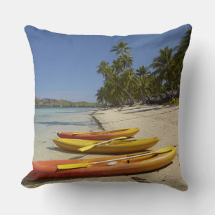 Kayaks on the beach, Plantation Island Resort Throw Pillow