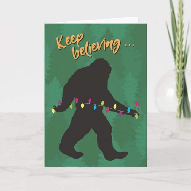 Keep Believing, Bigfoot with Christmas Tree Lights Holiday Card (Front)