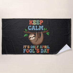 keep calm it's only April fool's day Beach Towel