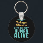 Keep The Tiny Human Alive Funny New Mom and Dad Keychain<br><div class="desc">Today's Mission Keep Tiny Human Alive. Funny and sarcastic Mother's Day and Father's Day design for new parents of baby boy or girl. Cool and awesome merchandise for first time mom and dad trying to take care of their baby. Perfect design for young mother and father with military or army...</div>
