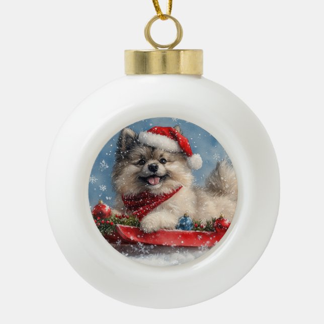 Keeshond Dog in Sledge Let it Snow Christmas Ceramic Ball Christmas Ornament (Front)