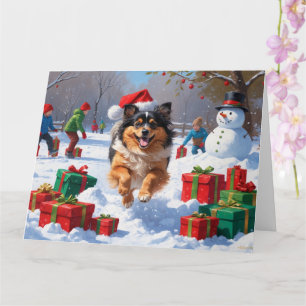 Keeshond Dog Running in Snow with Christmas Hat Card