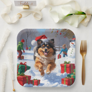 Keeshond Dog Running in Snow with Christmas Hat Paper Plate