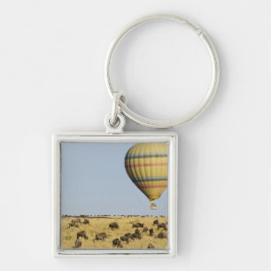Kenya, Masai Mara. Tourists ride hot air balloon Keychain