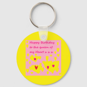 Key chain with birthday message on it yellow pink