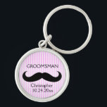 Keychain<br><div class="desc">This editable key chain can also be used as a zipper pull. It features a barbershop pink pinstripe, a silhouette of a mustache and the title or role of the person, their name and the wedding date. The text is editable so go ahead and change the details as well as...</div>