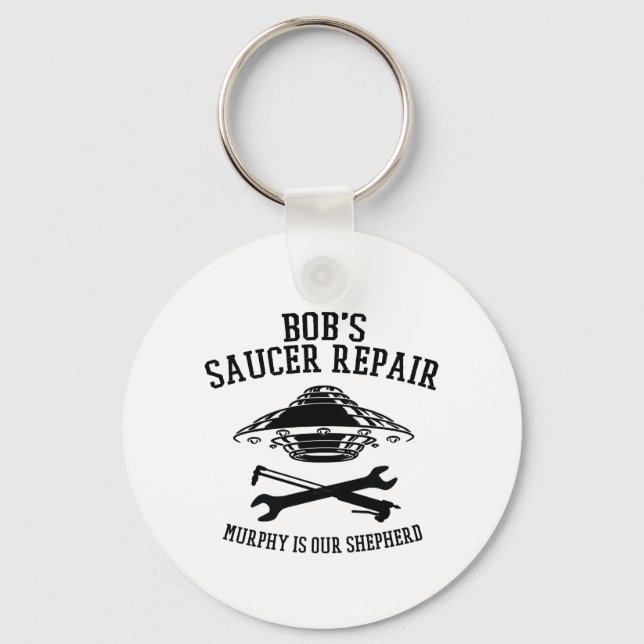 keychain with black Bob's Saucer Repair logo (Front)