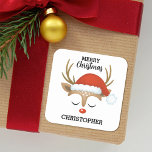 Kids Cute Christmas Reindeer Square Sticker<br><div class="desc">A cute and whimsical reindeer face with a Santa hat decorates this square sticker with the words Merry Christmas. Fun for your holiday gifts. Personalize it with your name. Designed for you by Blackberry Boulevard.</div>