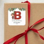 Kids Elf Initial B Christmas Square Sticker<br><div class="desc">Give the gift of personalized charm this Christmas! Our monogram stickers,  featuring Santa's elf hiding behind the letter B,  are a unique and thoughtful way to show your love. Customize with a name,  year and a heartfelt greeting. Make your Christmas gifts stand out!</div>