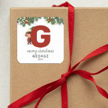 Kids Elf Initial G Christmas Square Sticker<br><div class="desc">Give the gift of personalized charm this Christmas! Our monogram stickers,  featuring Santa's elf hiding behind the letter G,  are a unique and thoughtful way to show your love. Customize with a name,  year and a heartfelt greeting. Make your Christmas gifts stand out!</div>