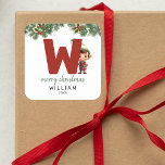 Kids Initial W Christmas Square Sticker<br><div class="desc">Give the gift of personalized charm this Christmas! Our monogram stickers,  featuring Santa's elf hiding behind the letter W,  are a unique and thoughtful way to show your love. Customize with a name,  year and a heartfelt greeting. Make your Christmas gifts stand out!</div>
