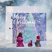 Kids looking up at Christmas tree