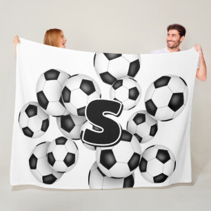 kids monogram overlying group of soccer balls fleece blanket