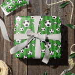 Kids Soccer Ball Pattern on Green Stripes Birthday Wrapping Paper<br><div class="desc">This fun kids sports equipment pattern has soccer balls on a green field striped background. The athletic gear design makes a cute addition to a birthday,  Christmas,  or other holiday gift,  especially for soccer-loving boys and girls.</div>