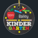 Kindergarten Colourful Chalk Keepsake Kids Photo Ceramic Ornament<br><div class="desc">Kindergarten ornament design features an apple, a ruler, crayons and bold, colourful fun typography and a photo on the back! Click the customize button for more options for modifying the text! Variations of this design, additional colours, as well as coordinating products are available in our shop, zazzle.com/store/doodlelulu. Contact us if...</div>