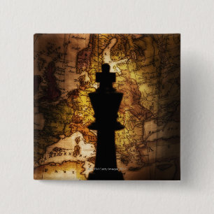 King chess piece on old world map 2 inch square button