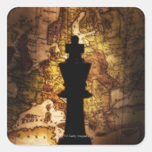 King chess piece on old world map square sticker