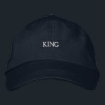KING text in sophisticated embroidery Soft Cotton  Embroidered Hat<br><div class="desc">Rule the day with this navy cap,  adorned with "KING" text in sophisticated embroidery. The soft cotton material and adjustable strap provide a comfortable and tailored fit for every occasion.</div>