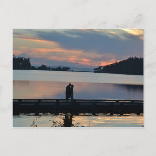 Kiss at sunset postcard