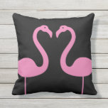 Kissing Flamingos Pink & Black Outdoor Pillow<br><div class="desc">This cute pink & black outdoor cushion is decorated with two pink flamingos in the silhouette of a heart, about to kiss, making it a great beach house, pool house, cottage, deck, patio or poolside accessory. This pillow coordinates perfectly with several other outdoor cushions in the Outdoor Pillow Collection or...</div>